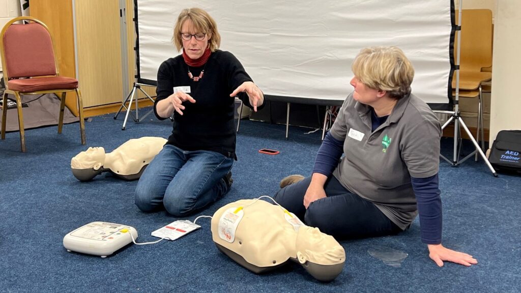 Members of Farm and Forestry First Aid demonstrate CPR to course attendees