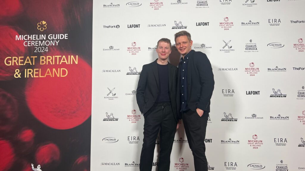 Pentonbridge Inn's General Manager, Ross Bell, and Head Chef, Chris Archer, at the 2024 Great Britain & Ireland Michelin Guide ceremony in Manchester.